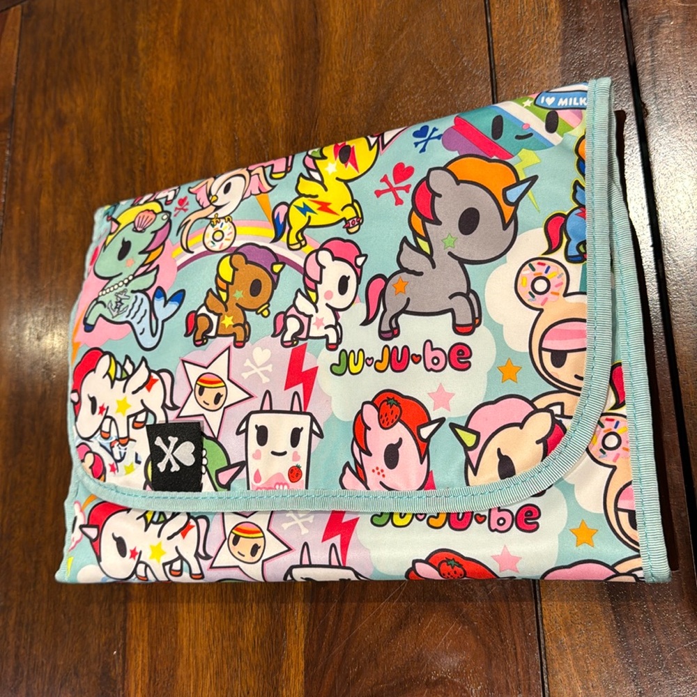 Jujube tokidoki changing pad.